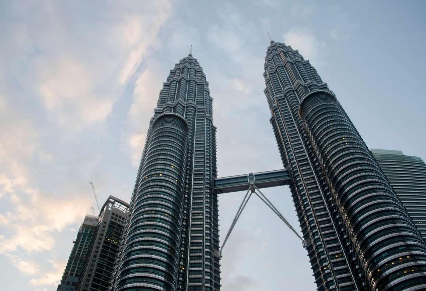 The Petronas Twin Towers seen from below against the sky
